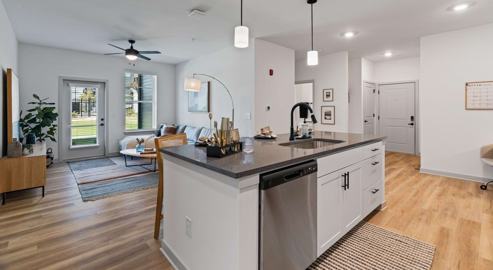 a kitchen with a wood floor