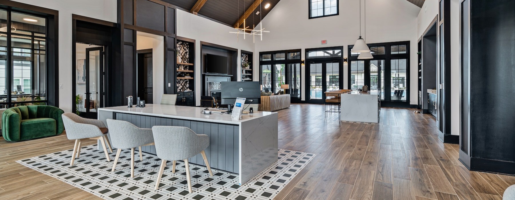 a leasing office with tables and chairs