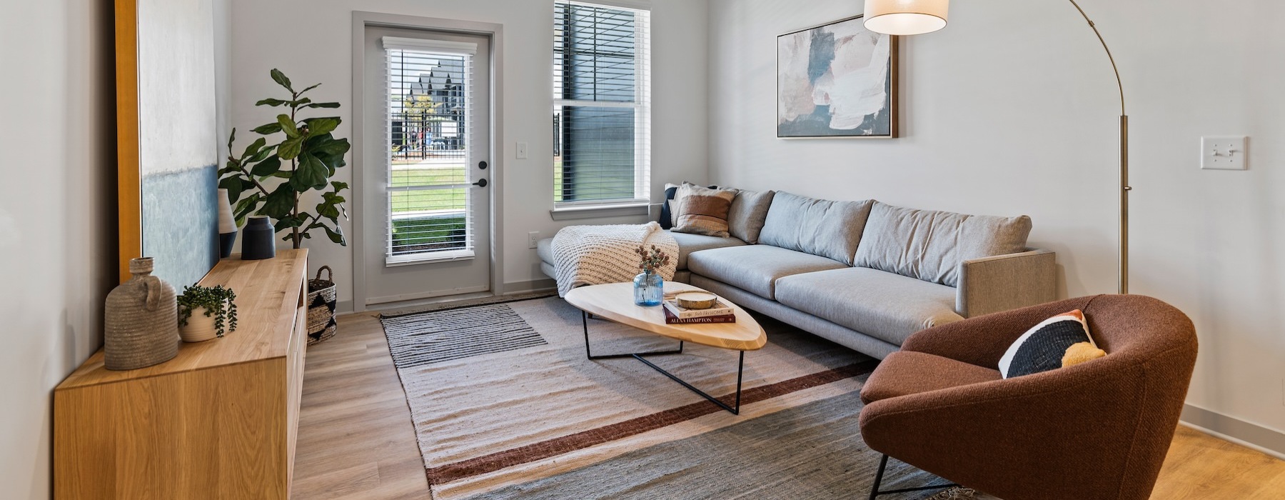 a living room with a couch and a chair