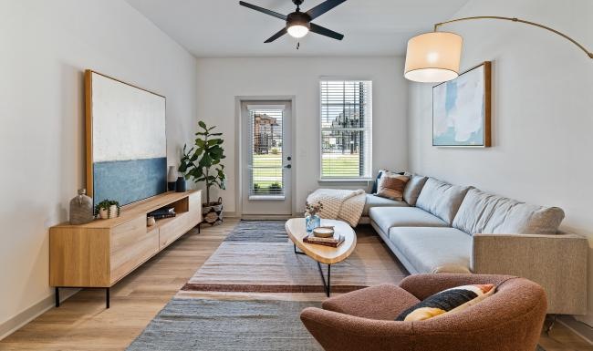 a living room with a couch and a chair